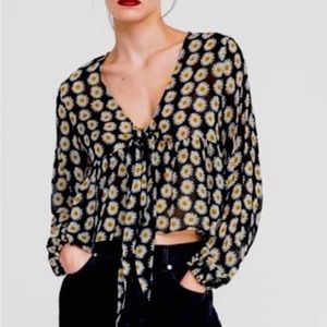 - Zara daisy print sheer blouse with sequinned bustier underneath.
